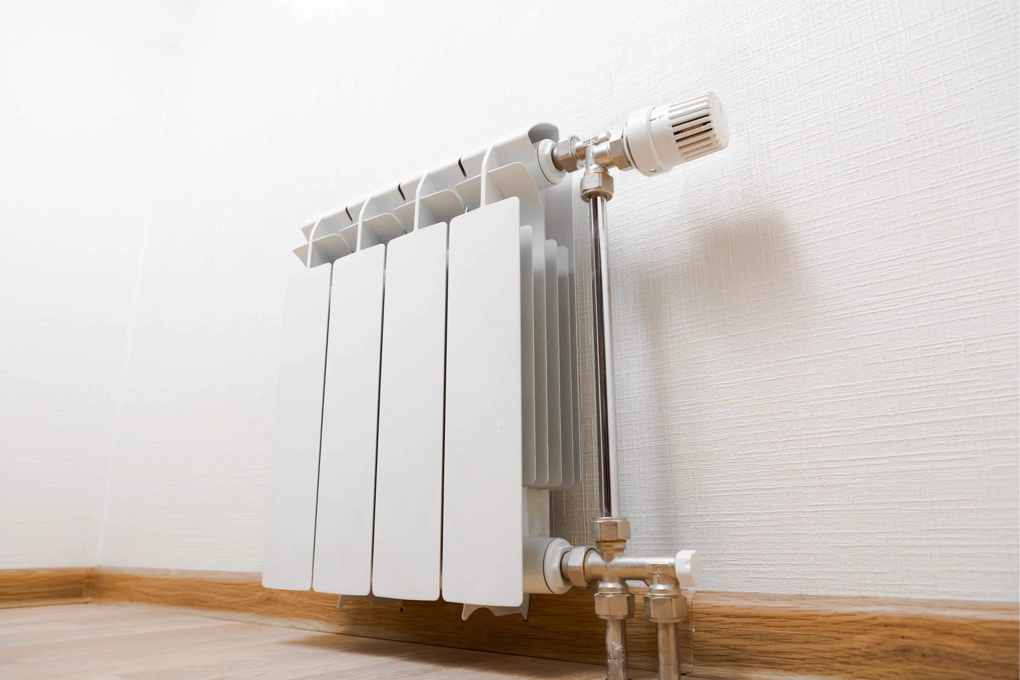 Stylish White Radiator Fitted In Home